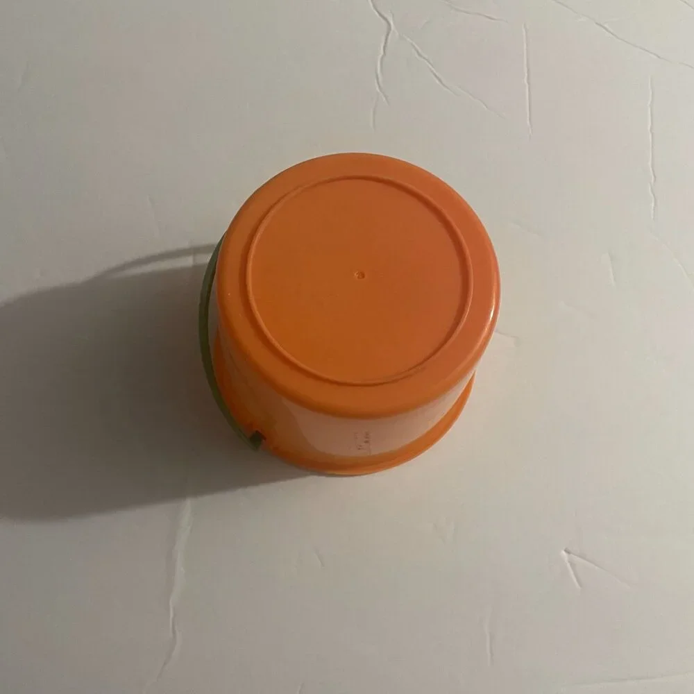 Small Orange Pail with Green Handle